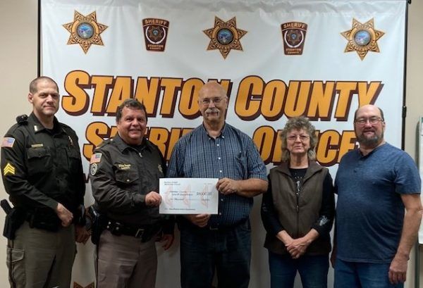 Sergeant Aaron Kleensang and Sheriff Unger Receive the $6000.00 Donation from Methodist Church Trustees.