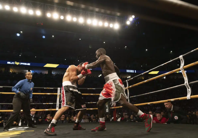 Terence Crawford, right, fights David Avanesyan during a World Boxing Organization welterweight world title boxing match on Saturday, Dec. 10, 2022, in Omaha, Neb. Crawford knocked out Avanesyan in the sixth round.