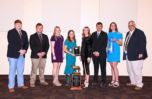 Northeast Community College Livestock Judging team members pose with their awards following the awards breakfast for the livestock judging contest at the 126th Annual Fort Worth Stock Show and Rodeo.