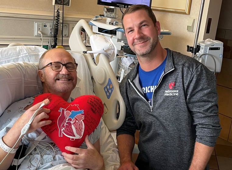 Dr. Keith Vrbicky is pictured during his recovery from heart transplant surgery with Dr. Scott Lundgren, cardiologist at the University of Nebraska Medical Center.