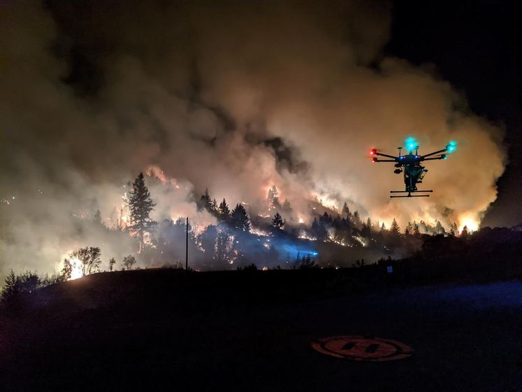 A Drone Amplified drone helps to fight a wildfire. The technology, created and turned into a company by a pair of University of Nebraska-Lincoln professors, helps fight fires while keeping firefighters safer.