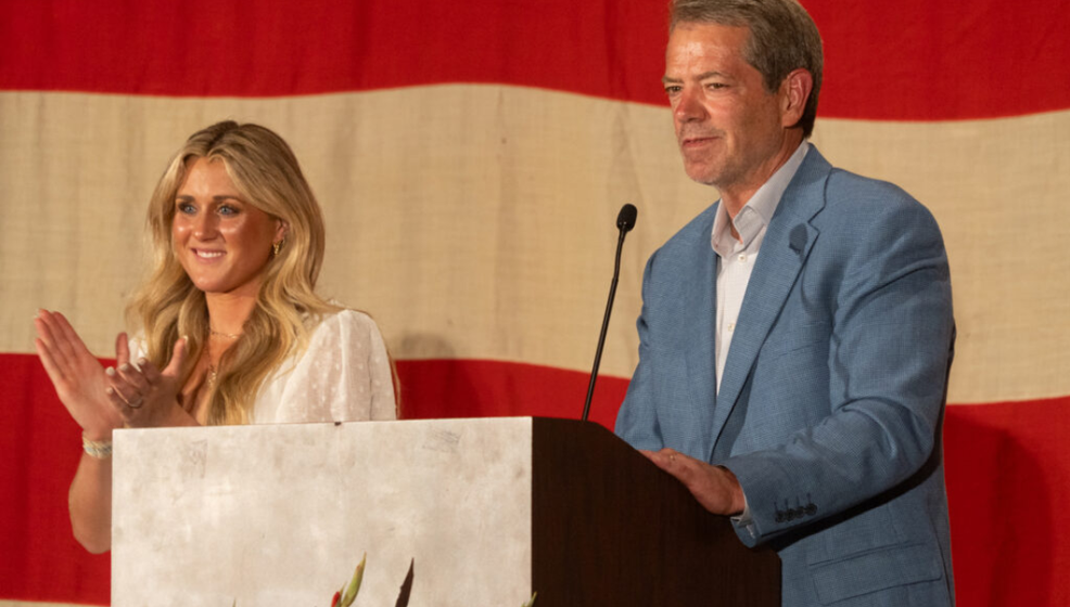 Gov. Jim Pillen, at right, speaks next to Riley Gaines on Sunday, Aug. 27, 2023, in La Vista.