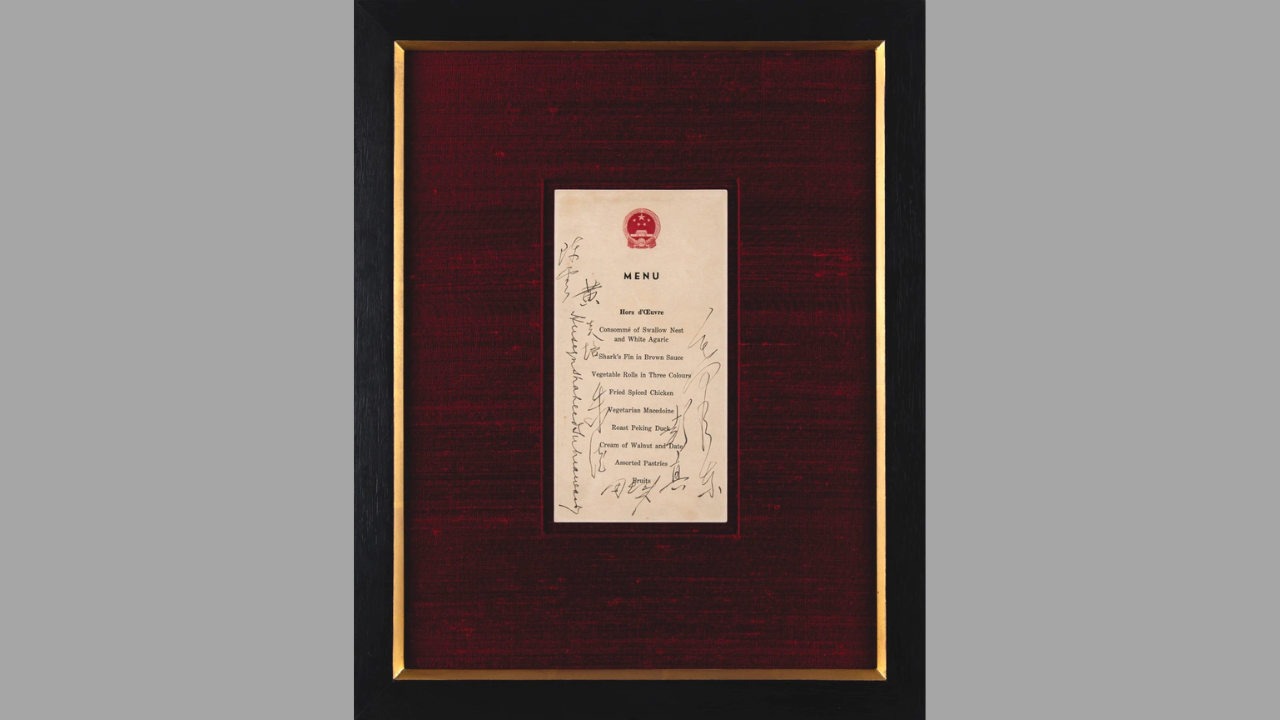 This photo provided by RR Auction shows an official menu for a state banquet signed by former Chinese leader Mao Zedong that has been auctioned for $275,000.
