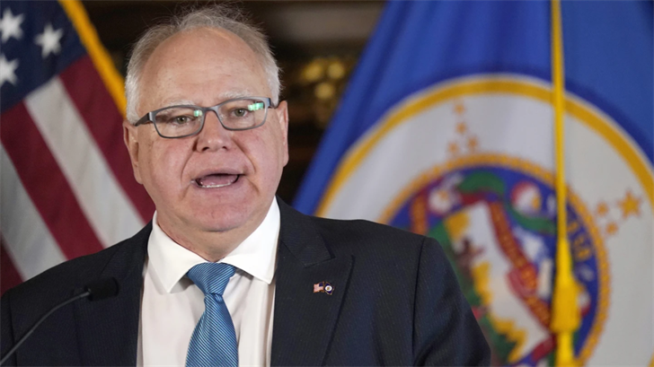 Minnesota Gov. Tim Walz speaks to the media, Nov. 9, 2022, in St. Paul, Minn.