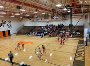 Stanton girls win a gritty battle, Norfolk Catholic boys roll