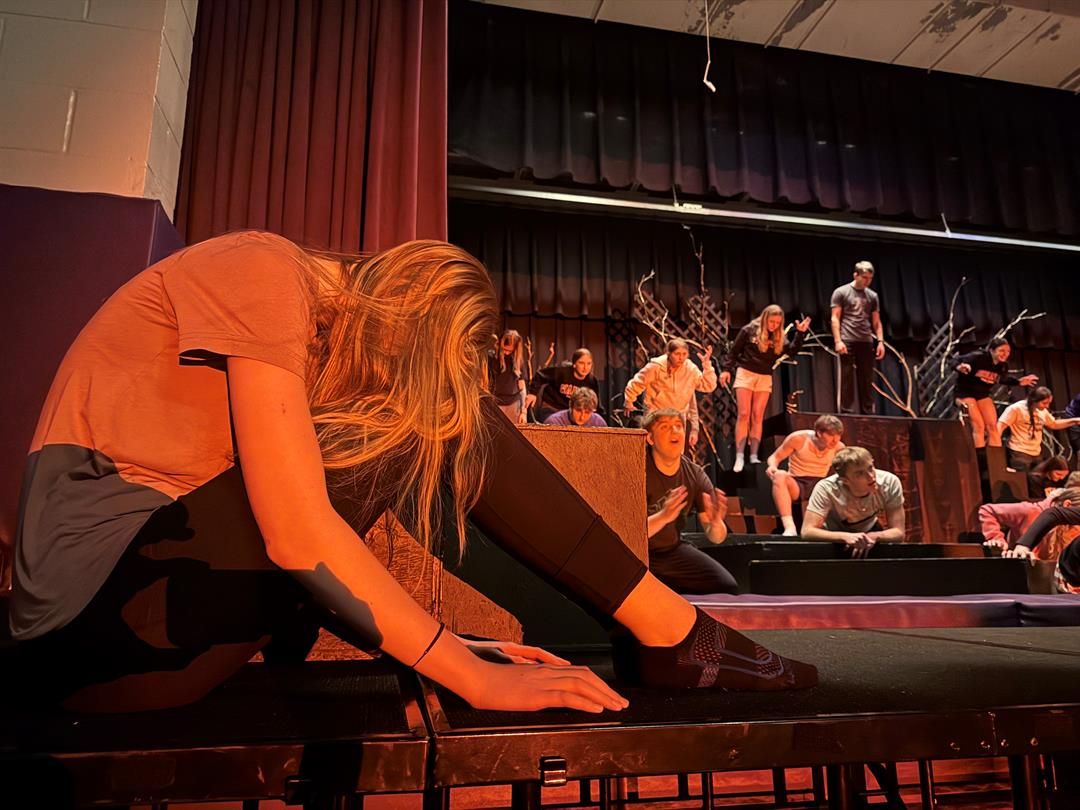 Carlie Kleinschmit and her fellow cast members rehearse the night before Wausa’s district-championship winning performance in the NSAA play production competition.