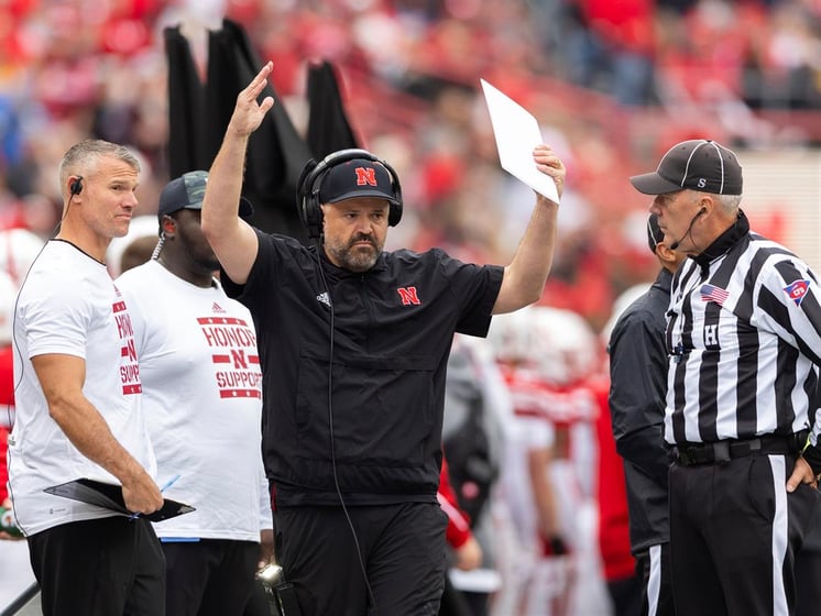 Nebraska head coach Matt Rhule, center, celebrates after a pass reception was confirmed by review against UCLA during the first half of an NCAA college football game, Nov. 2, 2024, in Lincoln, Neb.