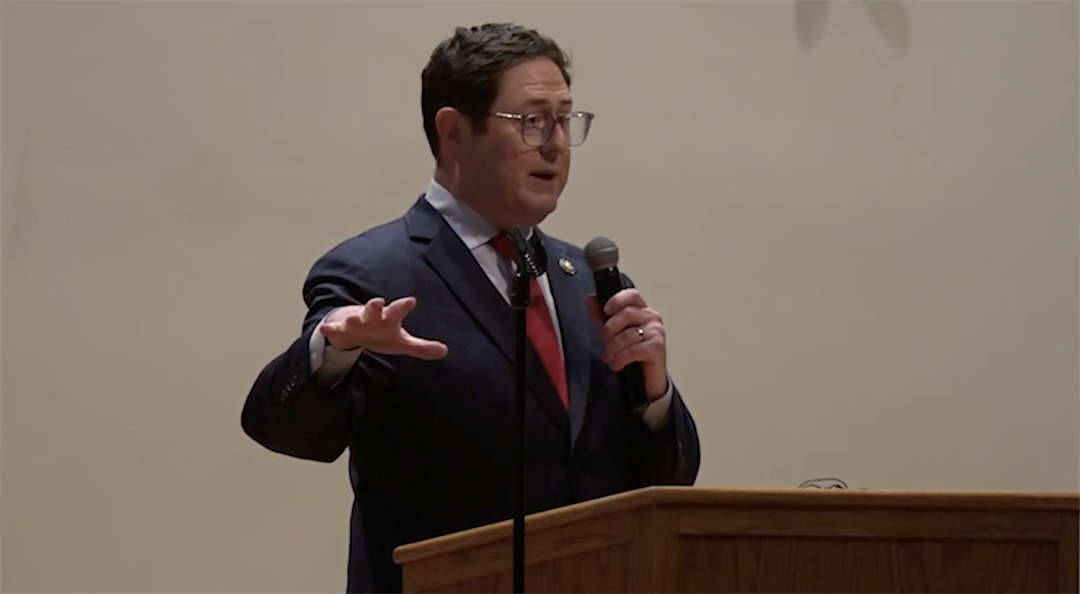 Rep. Mike Flood (R - Neb.) talks at a townhall event in Columbus.
