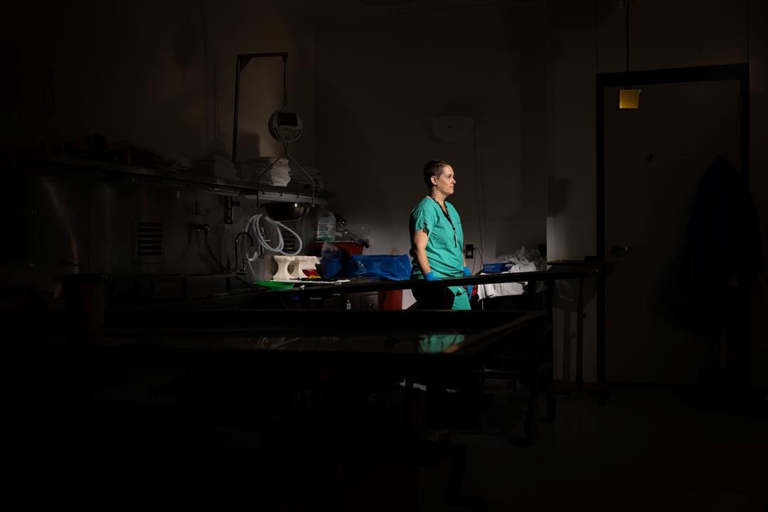 Forensic pathologist Dr. Erin Linde in the Douglas County coroner’s morgue. Photo by Rebecca S. Gratz for the Flatwater Free Press