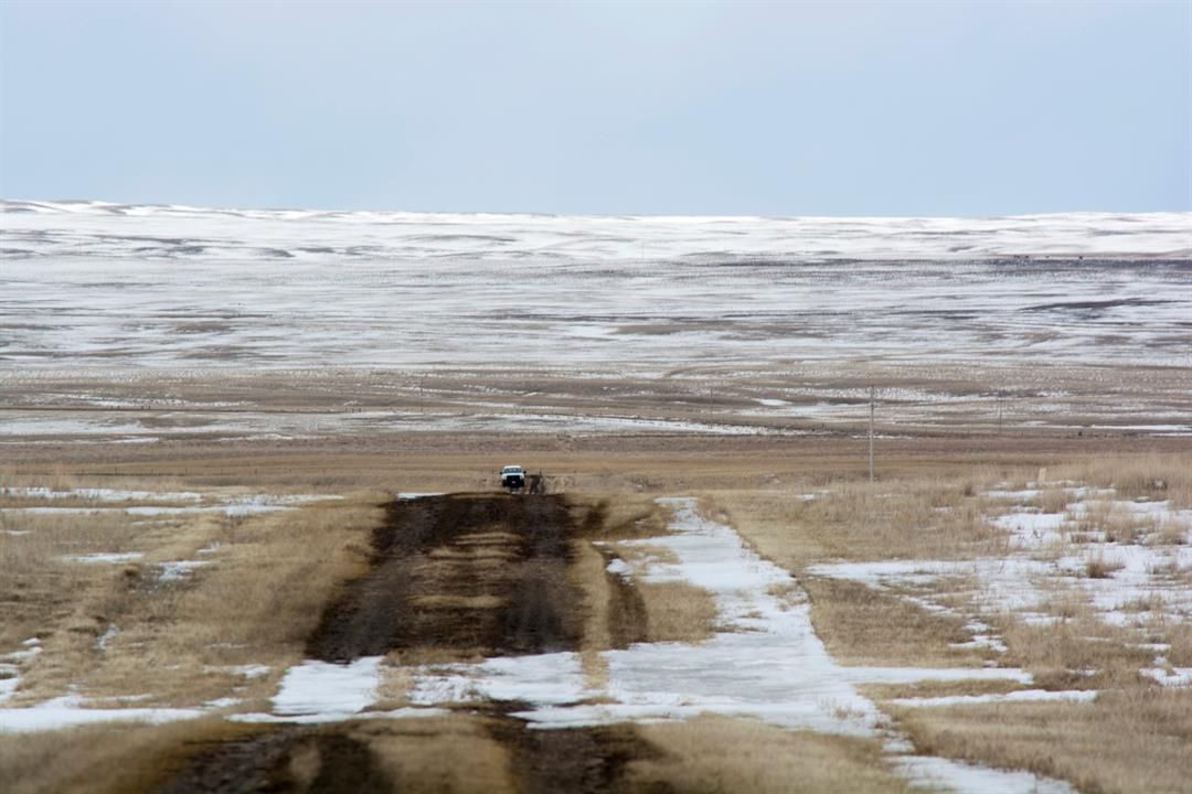 FILE - This photo provided by the Bureau of Land Management shows the proposed route of the Keystone XL oil pipeline where it crosses into the United States from Canada in Phillips County, Mont., March 11, 2020. (Al Nash/Bureau of Land Management via AP)