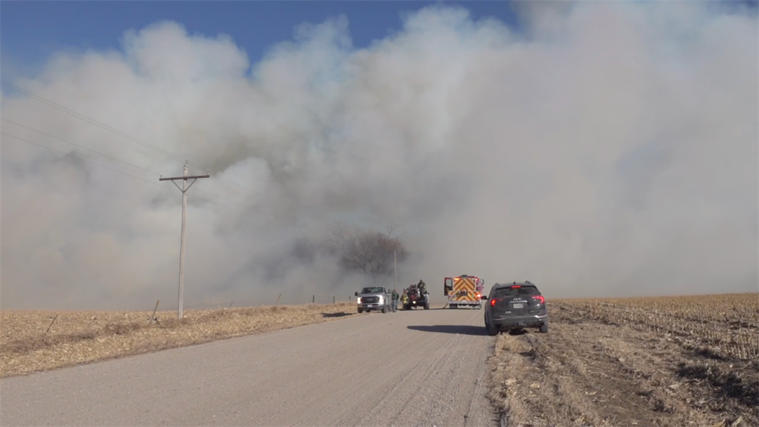 Grass fire burns several acres northeast of Norfolk